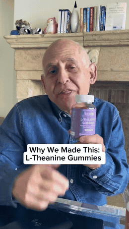 Arthur Reid, MD holding Lumenity L-Theanine Gummies